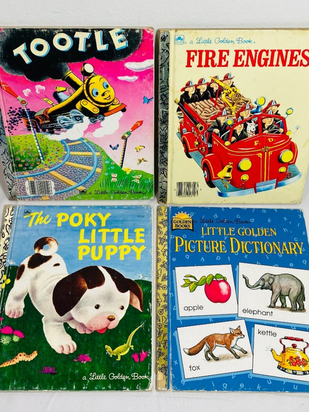 4 VNTG Little Golden Book 1945-1991: Tootle/Fire Engines/Poky Puppy/Dictionary